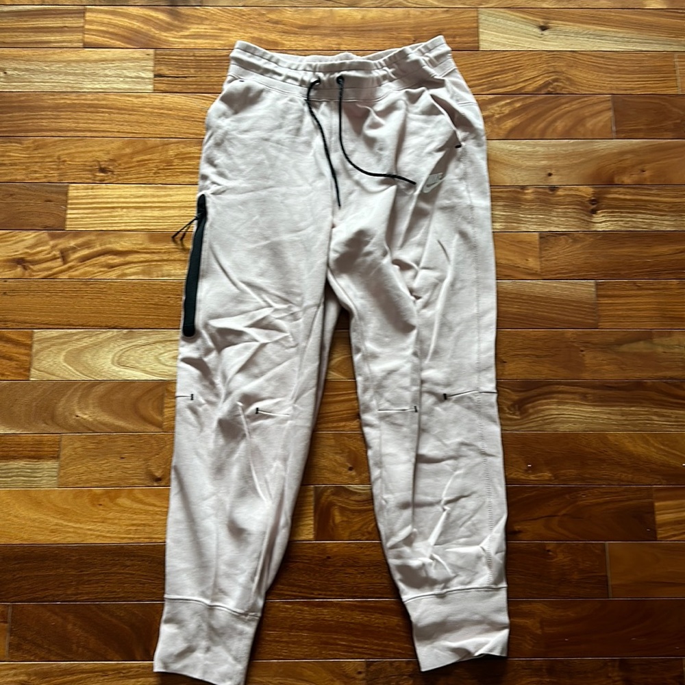 Women's pink nike tech pants size medium